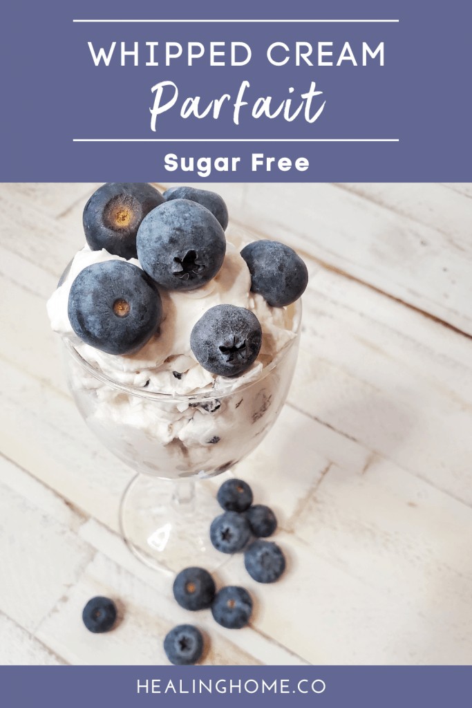 Blueberries whipped cream parfait in glass 