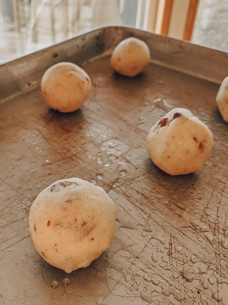 keto snowball cookies - place cookies on a well greased pan in small 1 inch balls 