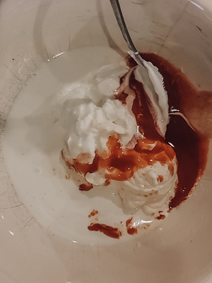 Combine the mayonnaise, sour cream, goat cheese, whipping cream, hot sauce, and seasoning in a bowl.