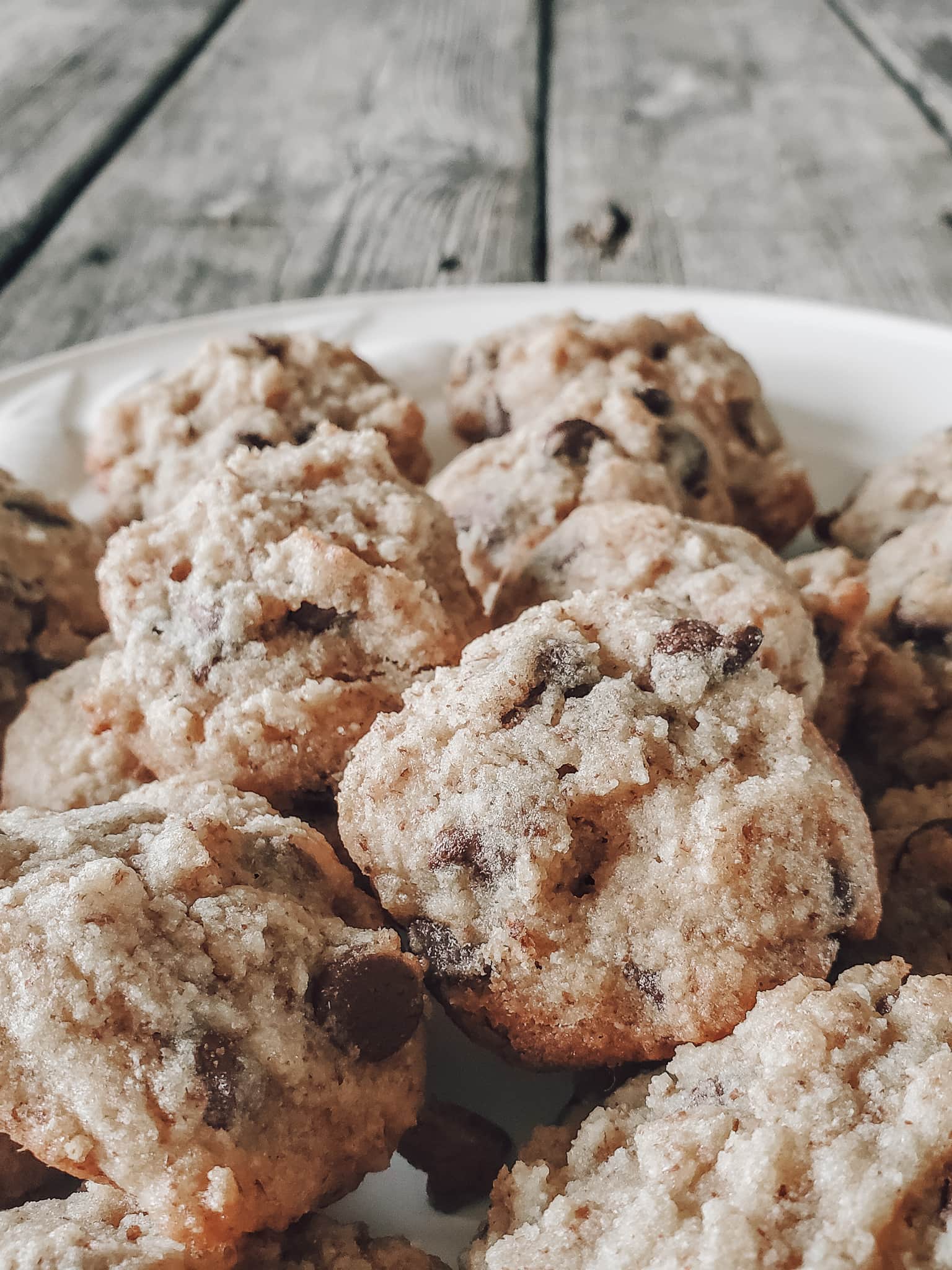 THM Chocolate Chip Cookies. Bake for 11 minutes. The edges should just be turning brown. Let cool on the baking pan before taking the cookies off the tray.