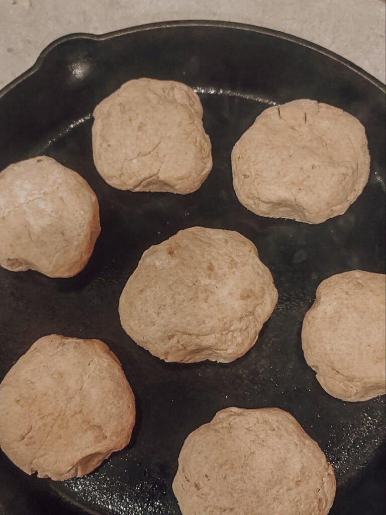 Preheat the oven to 400 degrees and place a large skillet inside (I usually need my large and small skillet). Once the skillet is preheated, place the biscuits on the preheated skillet about 1 -2 inches away from each other. Einkorn biscuits