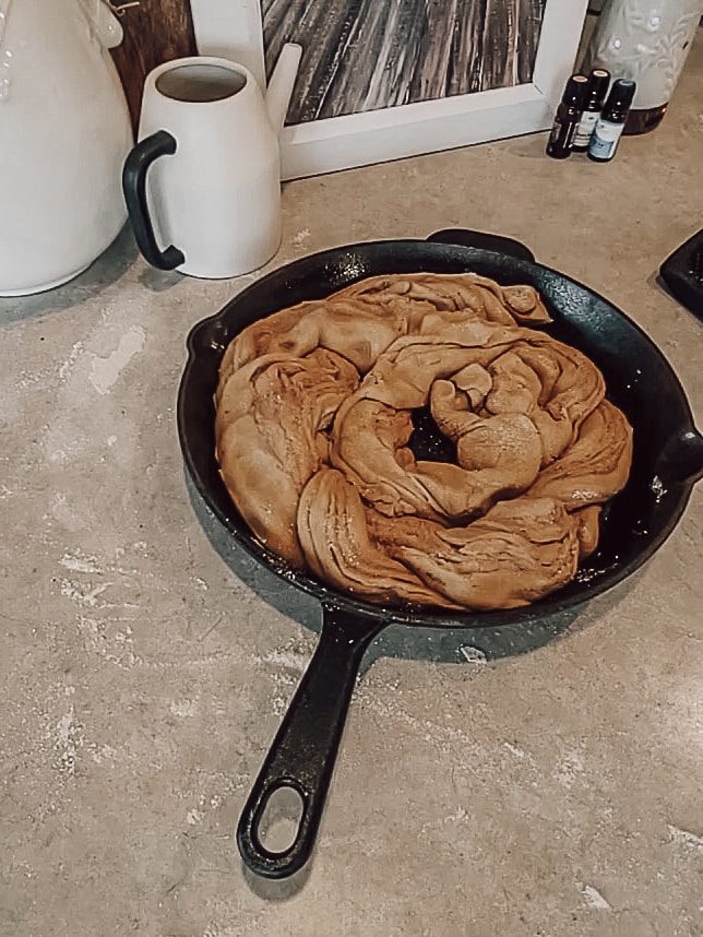 einkorn cinnamon rolls. Preheat the oven to 375 degrees and place a large cast-iron skillet inside to preheat. Once the skillet is preheated, place the wrapped dough around the skillet starting on the outside and working your way in. 