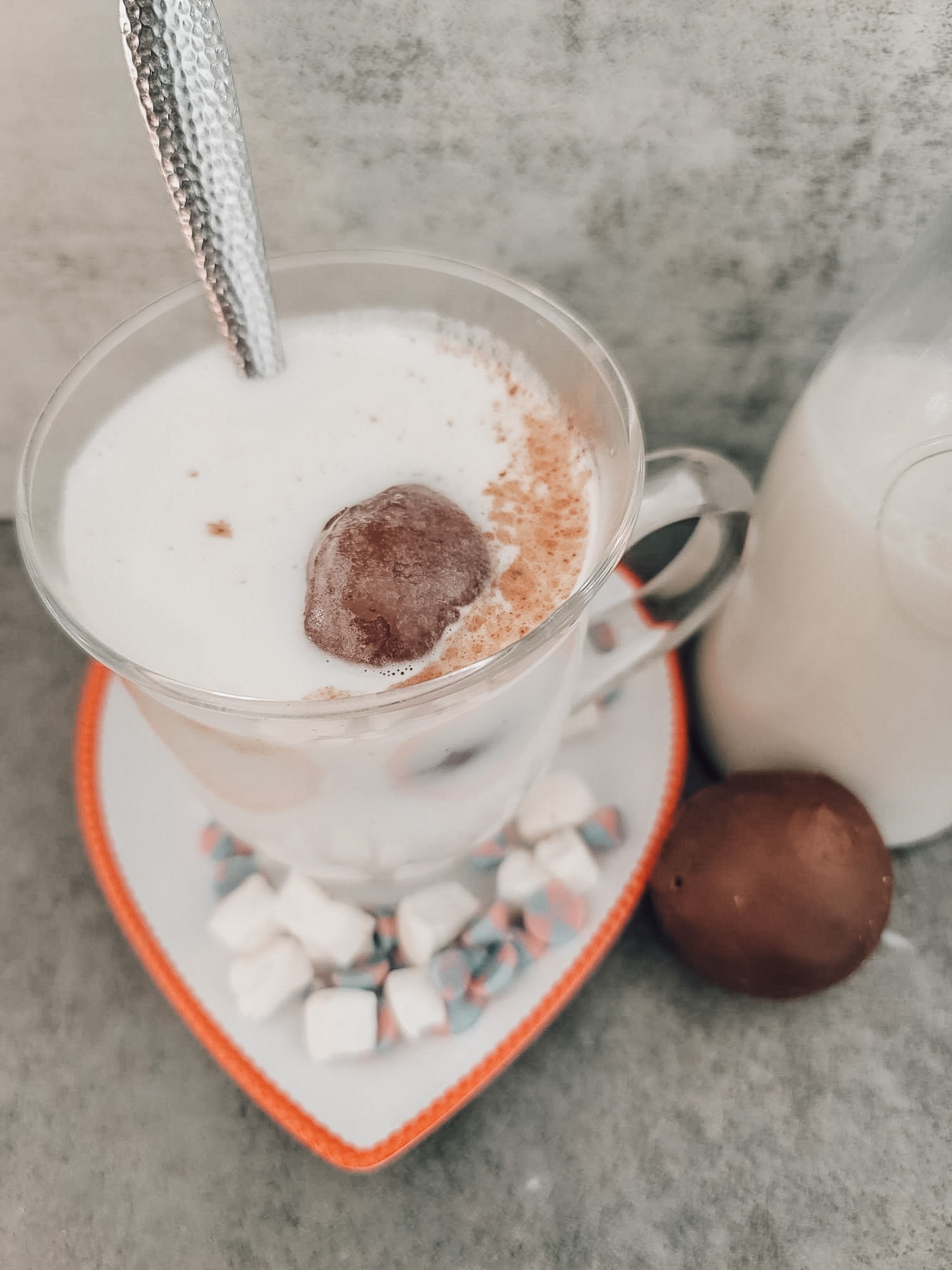Attach the melted side to the non-melted side and seal with your fingertip.  Warm the milk of your choice and plop a cocoa bomb into the heated milk. Tada! You have hot chocolate! . Hot cocoa bomb recipe 