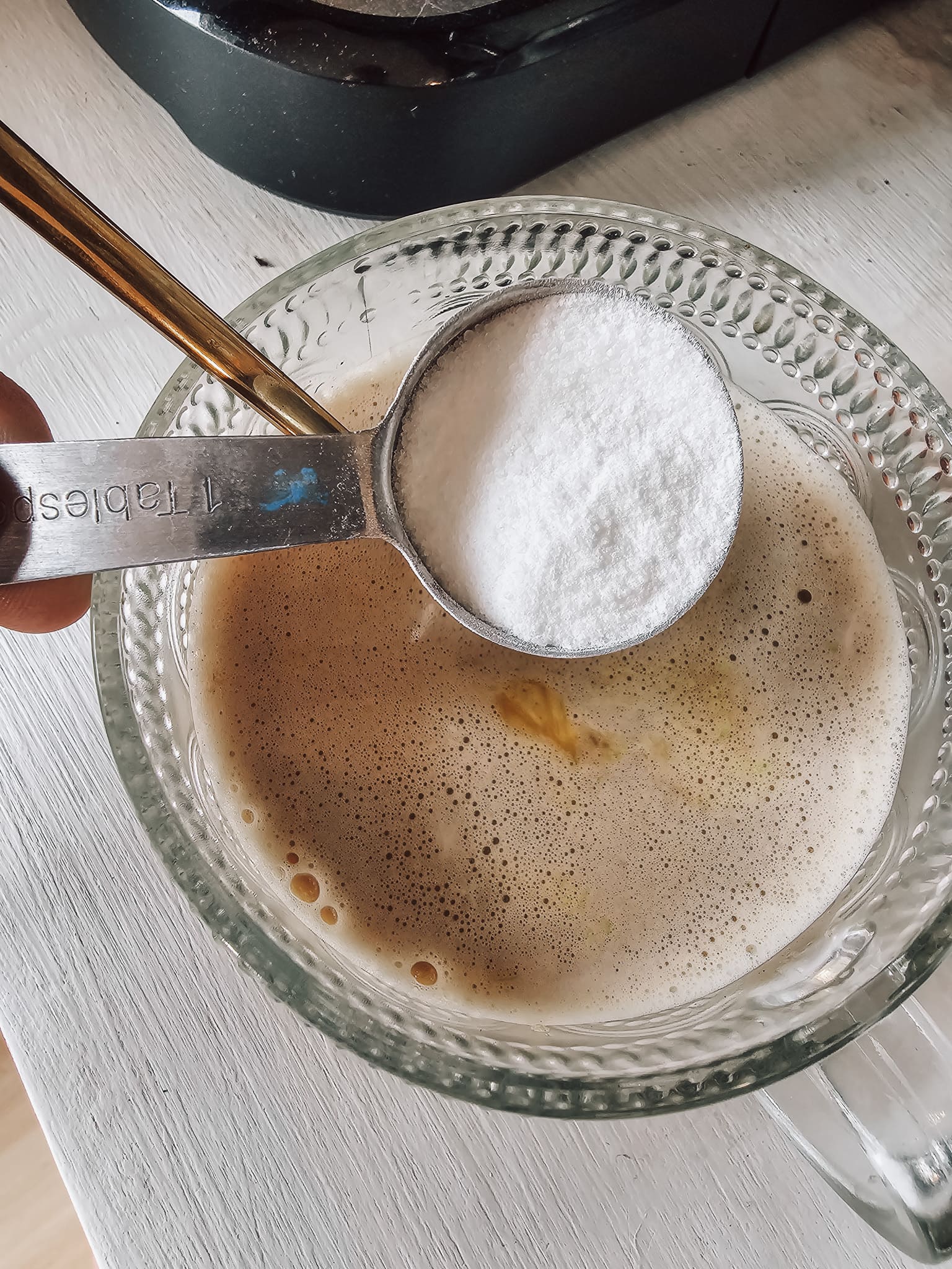Adding remaining ingredients into mug 