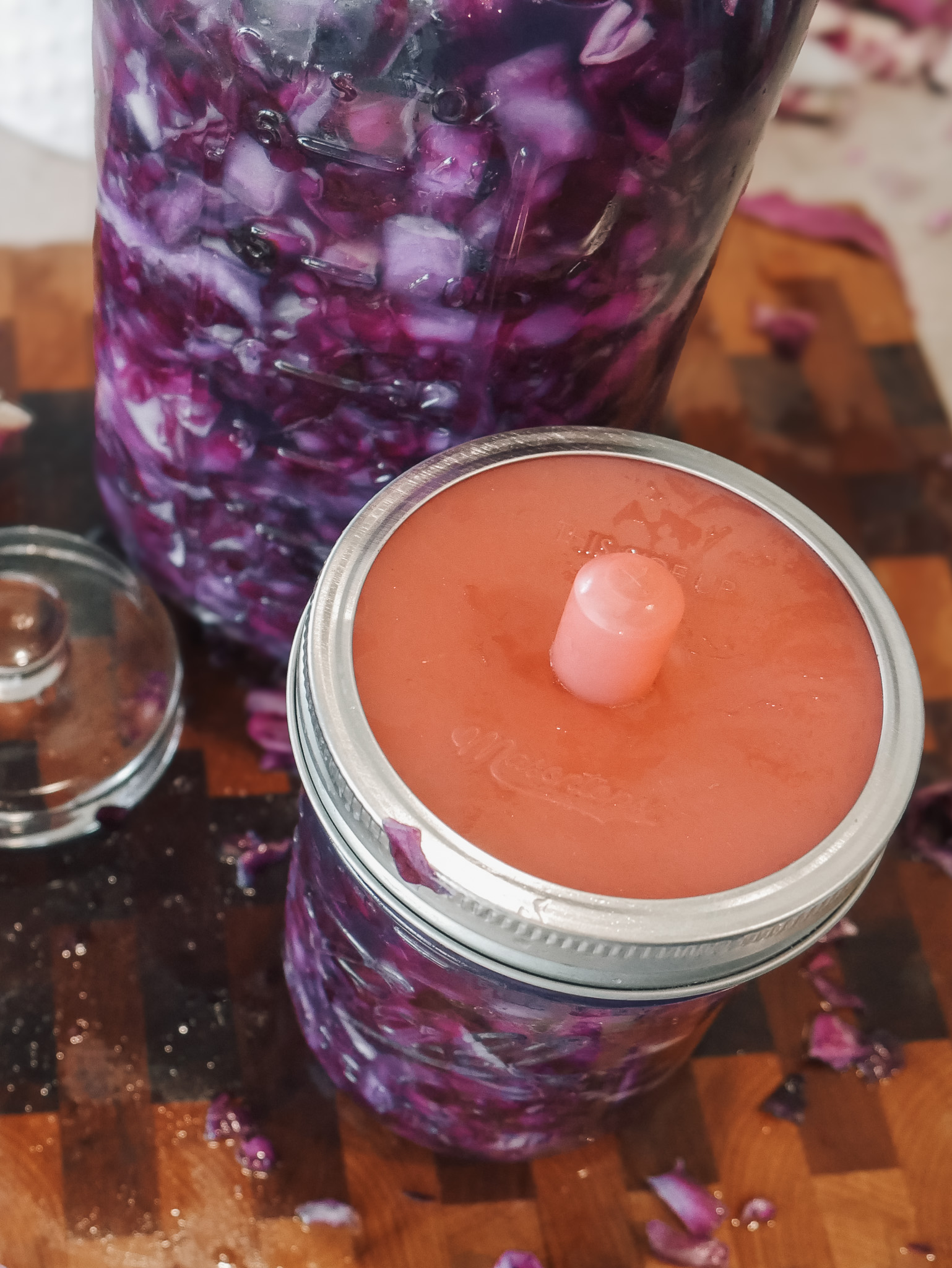 Classic Lacto-Fermented Sauerkraut - Leave about an inch of space at the top of the jar, then loosely attach the lid or use a fermentation lid if you have one.
